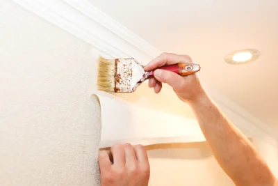 Pose de papier peint à Auzers — revêtements muraux et toiles de verre